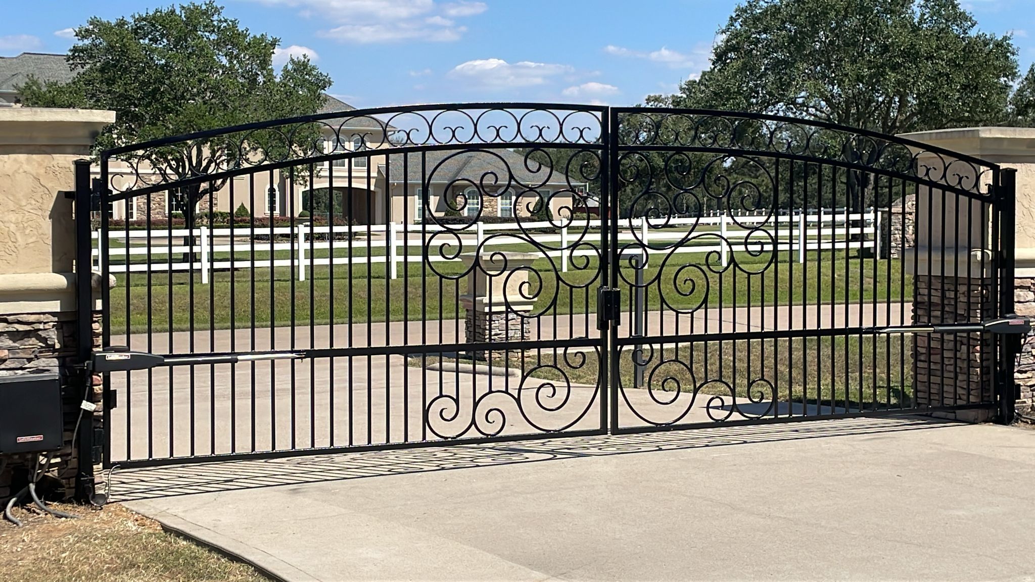 Completed ornamental automatic driveway gate